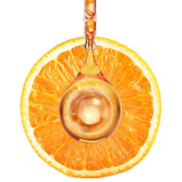 Orange slice with a droplet of Glowmedik Vitamin C serum on a white background