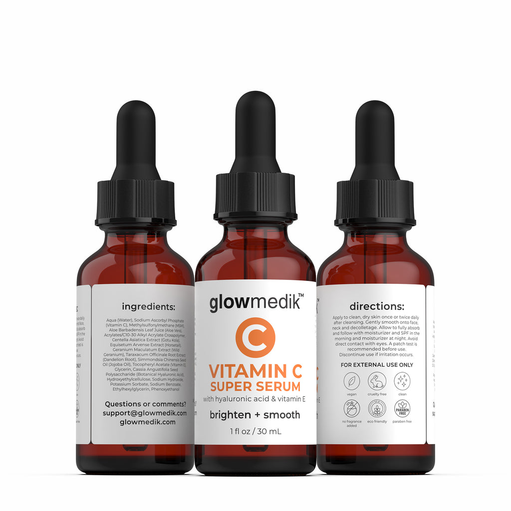Three bottles of GlowMedik Vitamin C Super Serum on a white background
