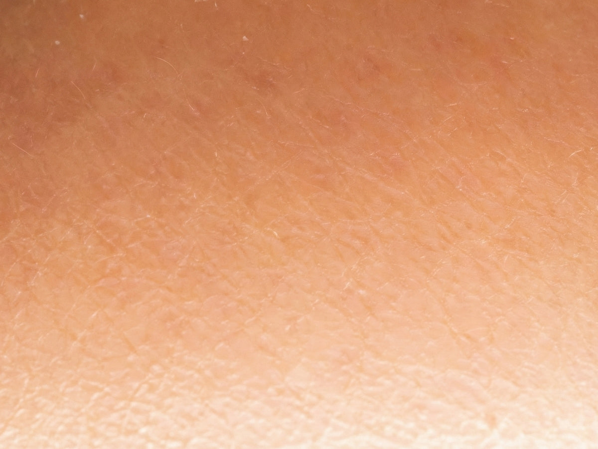 Close-up of hydrated skin after using Glowmedik hyaluronic acid serum